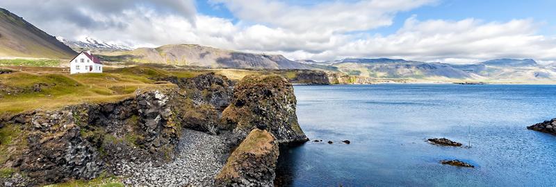 A cottage on the cliffs near the sea in Iceland
